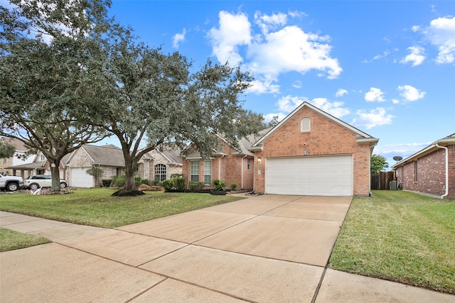 view of front of house featuring a front lawn and a garage