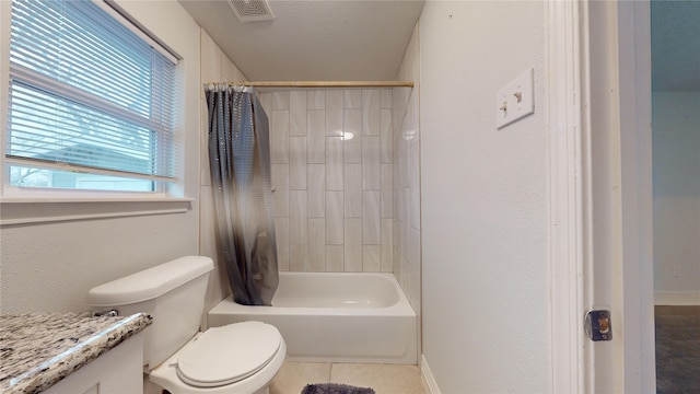 full bathroom featuring tile patterned flooring, vanity, shower / tub combo, and toilet