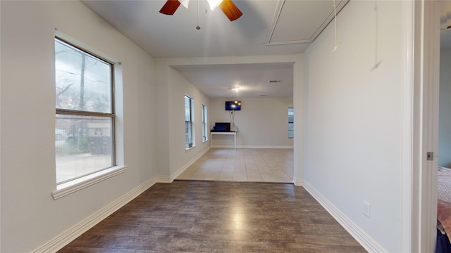 corridor with dark wood-type flooring