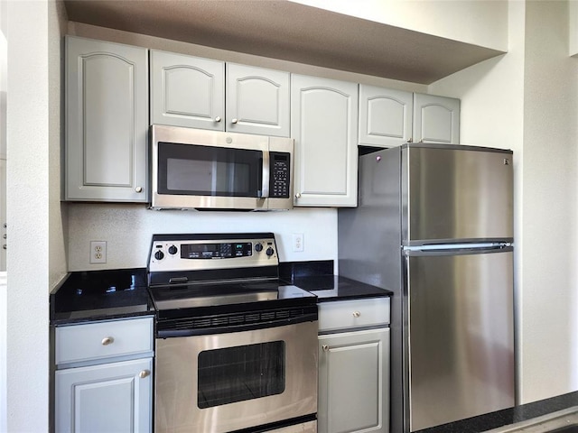 kitchen with white cabinets and stainless steel appliances