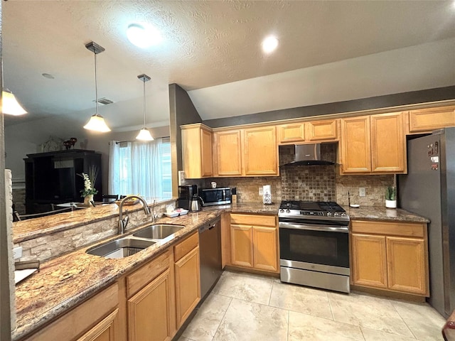 kitchen with tasteful backsplash, stainless steel appliances, sink, pendant lighting, and stone countertops