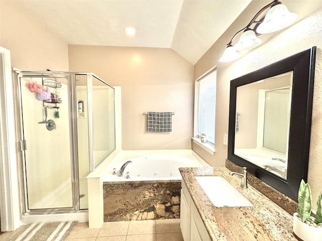 bathroom featuring vanity, tile patterned floors, separate shower and tub, and vaulted ceiling