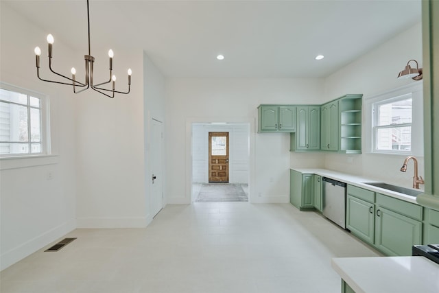 kitchen with a sink, visible vents, green cabinets, stainless steel dishwasher, and open shelves