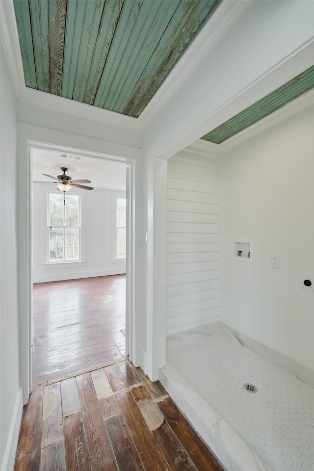 hall with wooden ceiling, dark hardwood / wood-style flooring, and crown molding