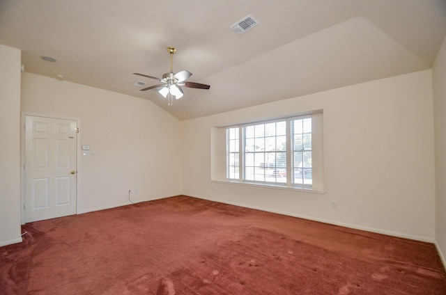 empty room with carpet floors, ceiling fan, and lofted ceiling