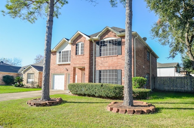 view of front property featuring a garage and a front lawn