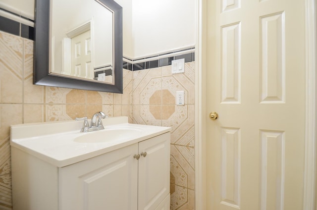 bathroom with decorative backsplash and vanity