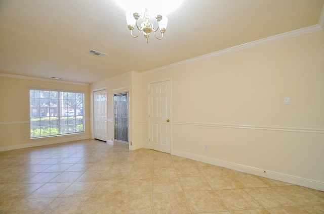 tiled empty room with crown molding and an inviting chandelier