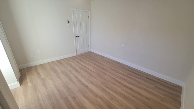 unfurnished room featuring light wood-type flooring