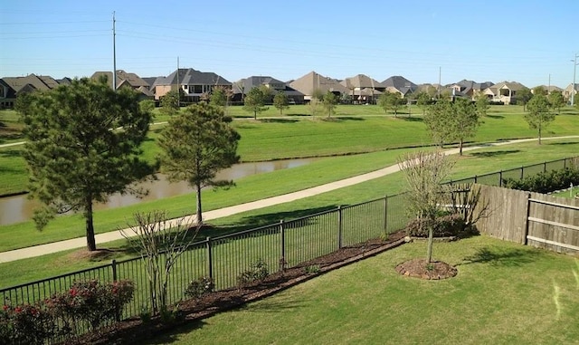 view of community featuring a yard