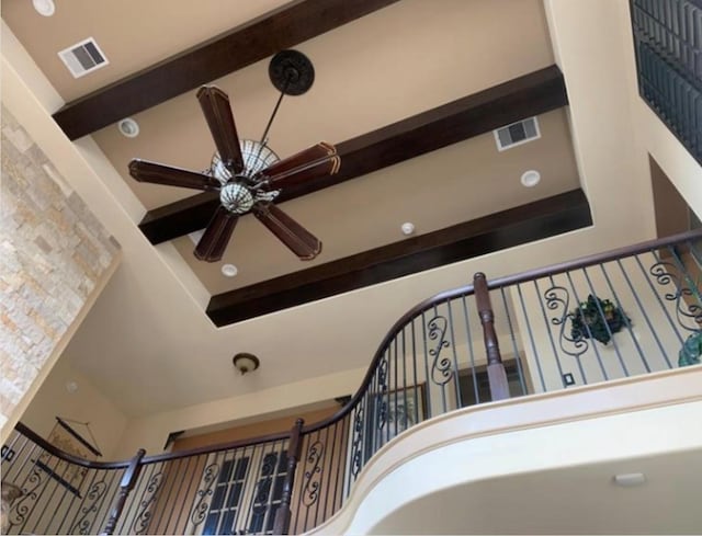 staircase with ceiling fan