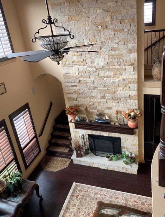 living room with hardwood / wood-style flooring and a fireplace