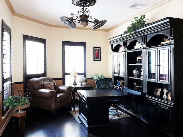 home office featuring dark hardwood / wood-style floors, ceiling fan, and ornamental molding