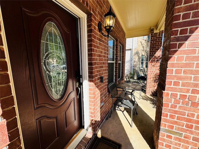 entrance to property with a porch