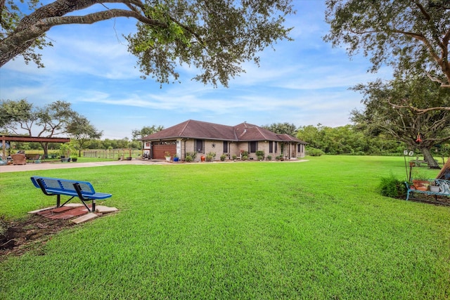 view of yard featuring a garage