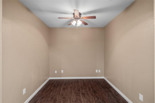 empty room with hardwood / wood-style floors and ceiling fan