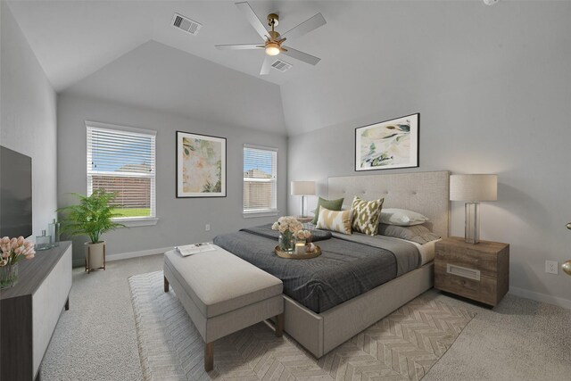 bedroom featuring light carpet, ceiling fan, and lofted ceiling