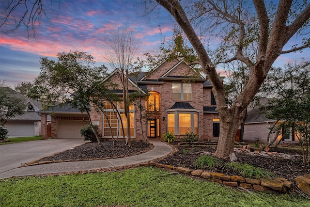 view of front of house with a garage