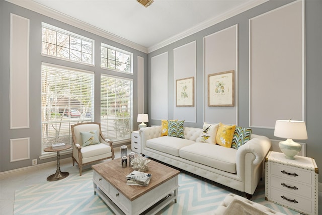 living area with ornamental molding