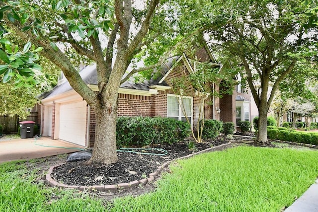 3803 Dewalt Way, Missouri City, TX 77459 - view of front facade with brick siding, a garage, and roof with shingles