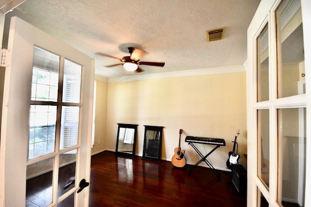 3803 Dewalt Way, Missouri City, TX 77459 - unfurnished room featuring a textured ceiling, dark hardwood / wood-style floors, ceiling fan, and ornamental molding