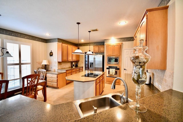 3803 Dewalt Way, Missouri City, TX 77459 - kitchen with backsplash, sink, a kitchen island, and appliances with stainless steel finishes
