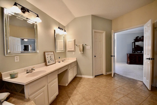 3803 Dewalt Way, Missouri City, TX 77459 - bathroom featuring tile patterned flooring, vanity, and vaulted ceiling