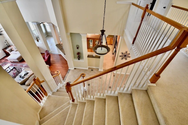 3803 Dewalt Way, Missouri City, TX 77459 - stairs with a towering ceiling and carpet floors