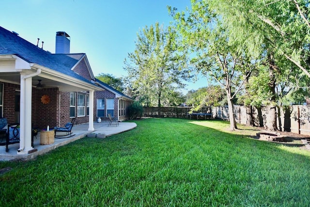 3803 Dewalt Way, Missouri City, TX 77459 - view of yard featuring a patio area and a trampoline