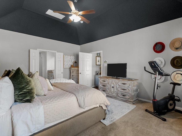 bedroom with ceiling fan, light colored carpet, and high vaulted ceiling