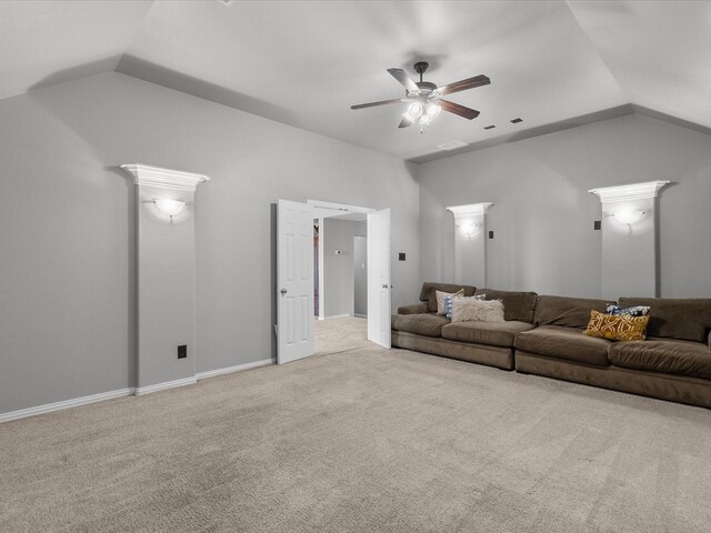 living room featuring light carpet, ceiling fan, and lofted ceiling