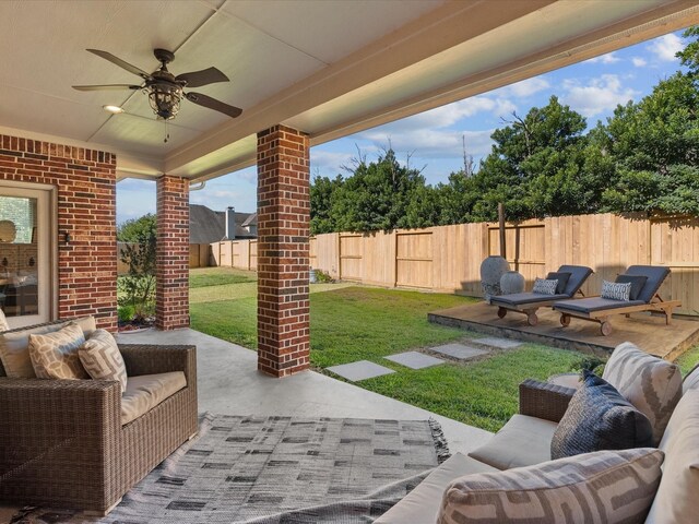 view of patio with ceiling fan and an outdoor hangout area