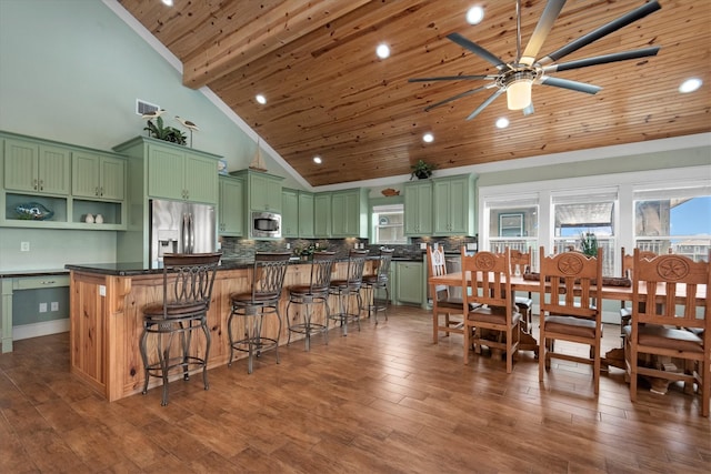 dining room featuring wooden ceiling, high vaulted ceiling, ceiling fan, beam ceiling, and dark hardwood / wood-style flooring