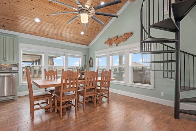 dining area with hardwood / wood-style floors, ceiling fan, and wood ceiling