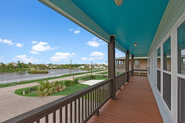 deck featuring a water view