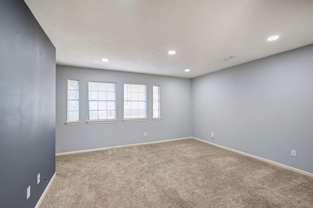 view of carpeted spare room