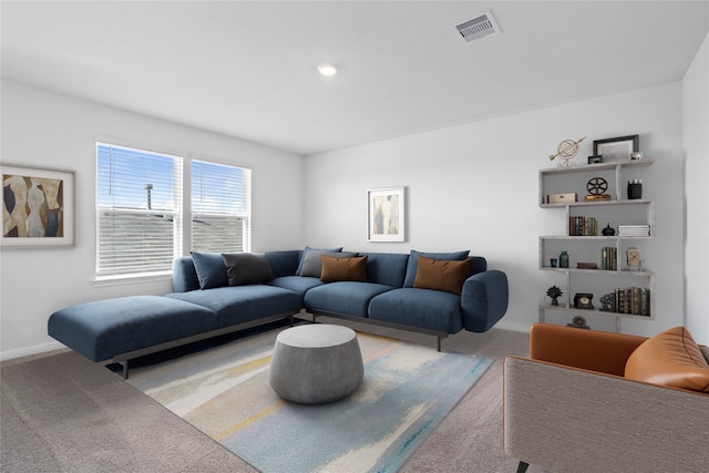 living room with light colored carpet