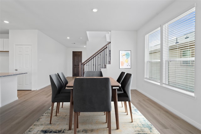 dining room featuring light hardwood / wood-style flooring