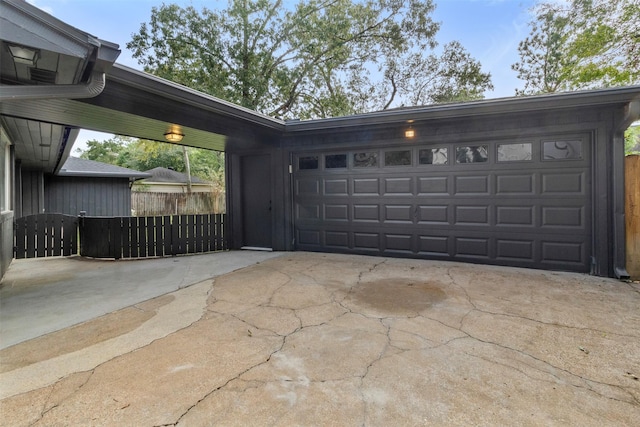 garage featuring a carport