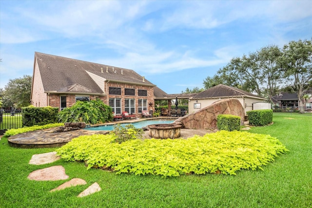 exterior space with a fenced in pool