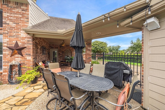 view of patio featuring a grill