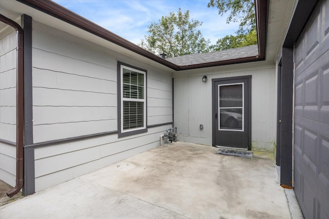 entrance to property with a patio area