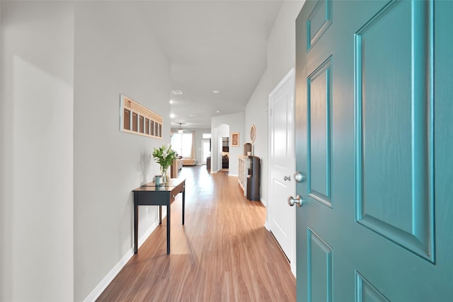 hallway featuring light hardwood / wood-style flooring