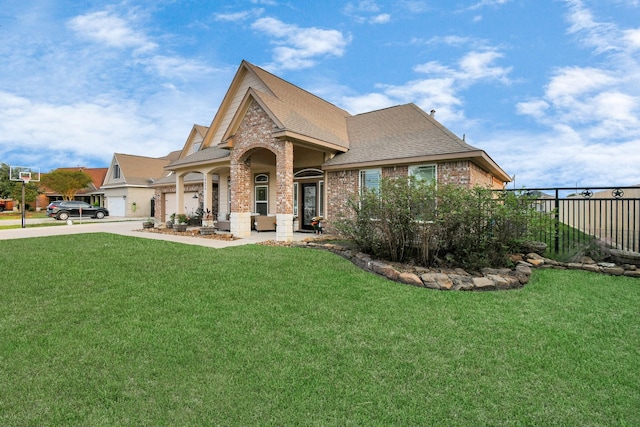 view of front of property with a front lawn