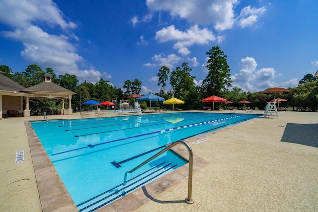 view of pool with a gazebo and a patio area