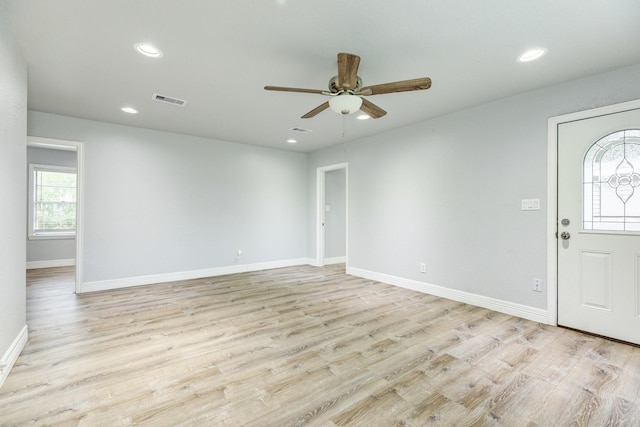 foyer entrance featuring ceiling fan and light hardwood / wood-style flooring