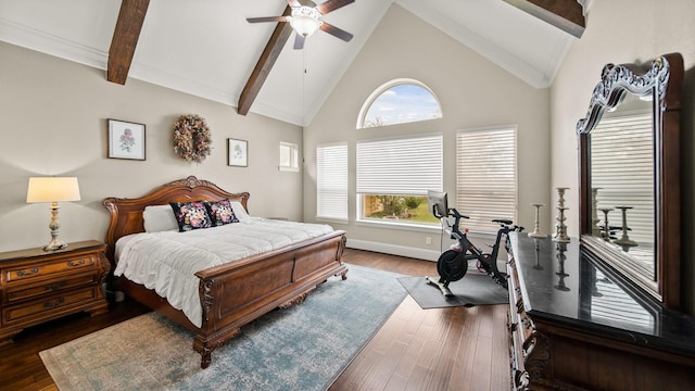 bedroom with beamed ceiling, ceiling fan, dark hardwood / wood-style floors, and high vaulted ceiling