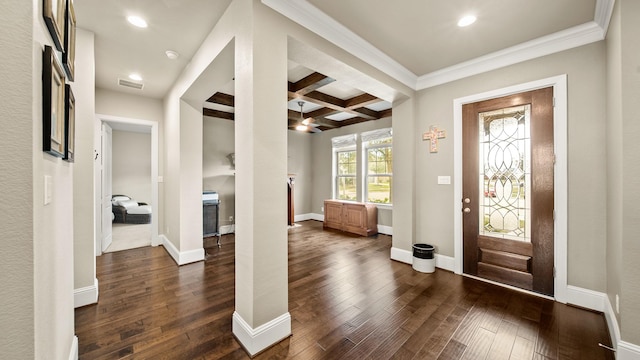 foyer entrance featuring beamed ceiling, coffered ceiling, dark hardwood / wood-style flooring, and crown molding