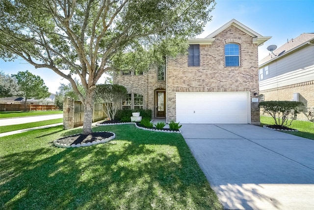 view of front of home with a garage and a front lawn