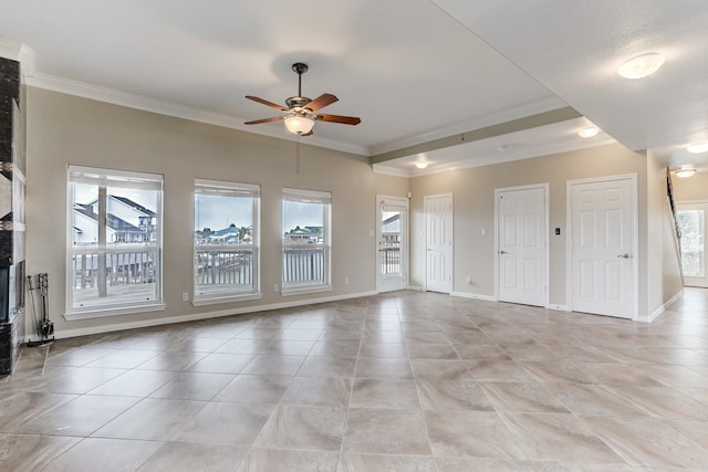 unfurnished living room with ceiling fan, ornamental molding, and a fireplace